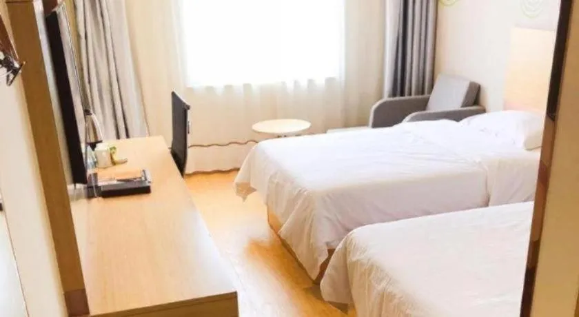 Bed in GreenTree Inn Binzhou Wudi County Yinzuo Plaza Express Hotel