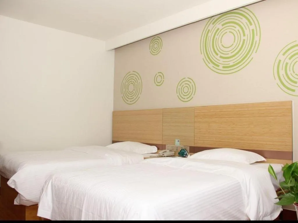 Bed in GreenTree Inn Binzhou Wudi County Yinzuo Plaza Express Hotel