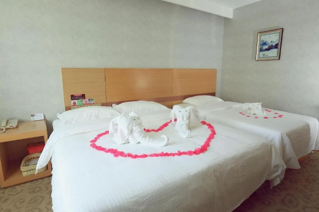 Bed in GreenTree Inn Binzhou Wudi County Yinzuo Plaza Express Hotel