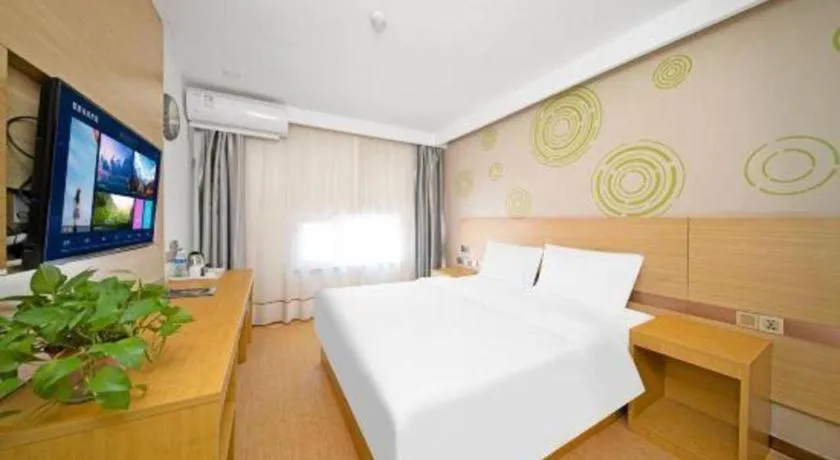 Bed in GreenTree Inn Binzhou Wudi County Yinzuo Plaza Express Hotel