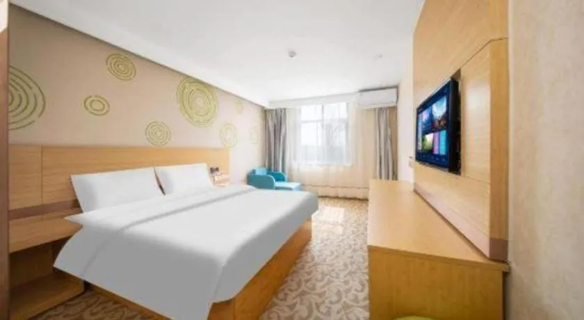 Bed in GreenTree Inn Binzhou Wudi County Yinzuo Plaza Express Hotel