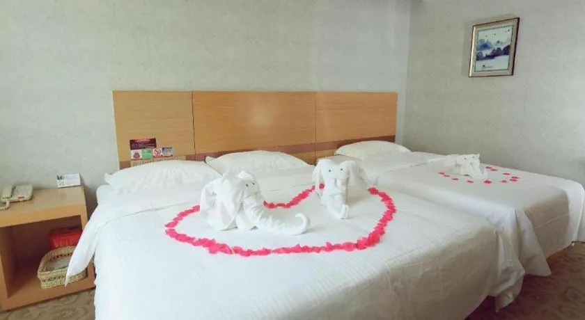 Bed in GreenTree Inn Binzhou Wudi County Yinzuo Plaza Express Hotel