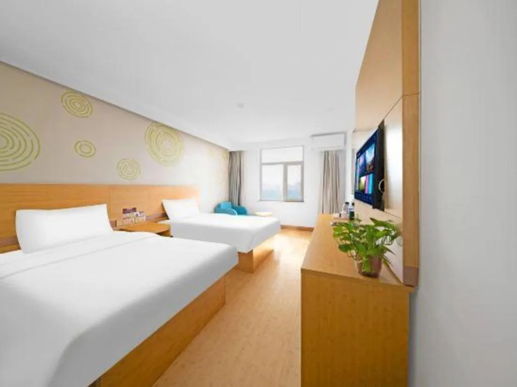 Bed in GreenTree Inn Binzhou Wudi County Yinzuo Plaza Express Hotel