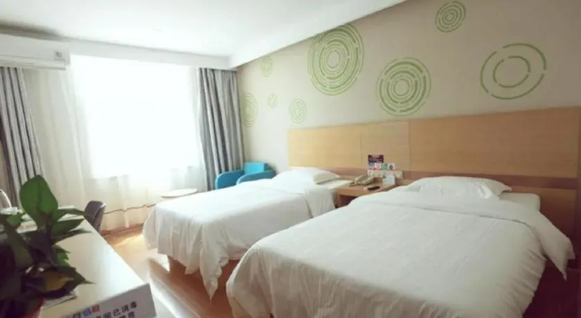 Bed in GreenTree Inn Binzhou Wudi County Yinzuo Plaza Express Hotel