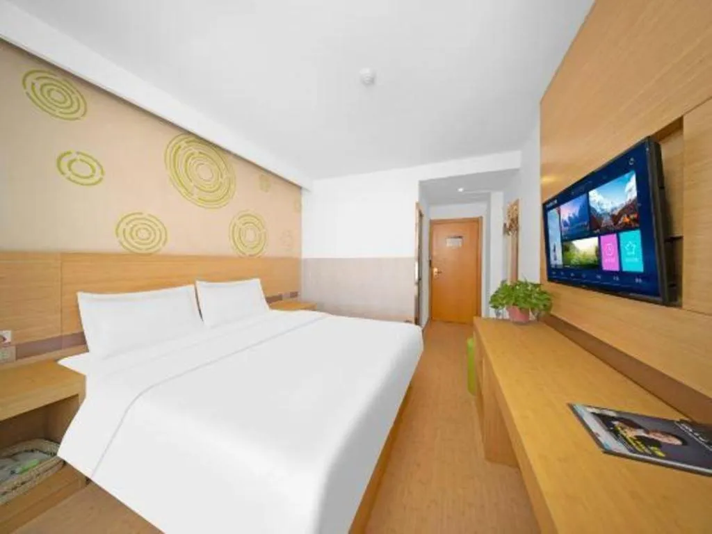Bed in GreenTree Inn Binzhou Wudi County Yinzuo Plaza Express Hotel