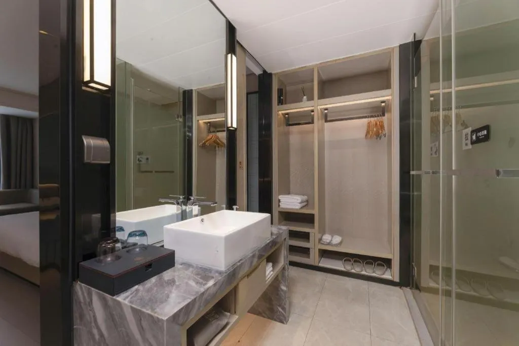 Bed in Echarm Hotel Wuxi Zhongnan Road Ancient Canal