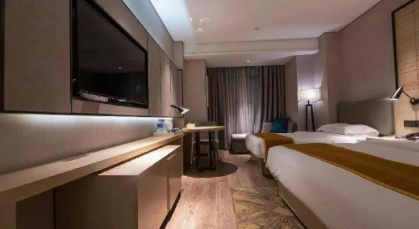 Bed in Echarm Hotel Wuxi Zhongnan Road Ancient Canal