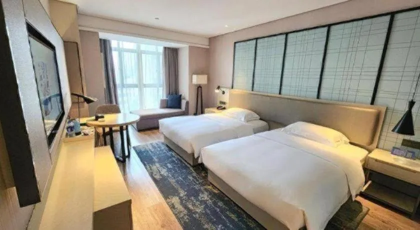 Bed in Echarm Hotel Wuxi Zhongnan Road Ancient Canal