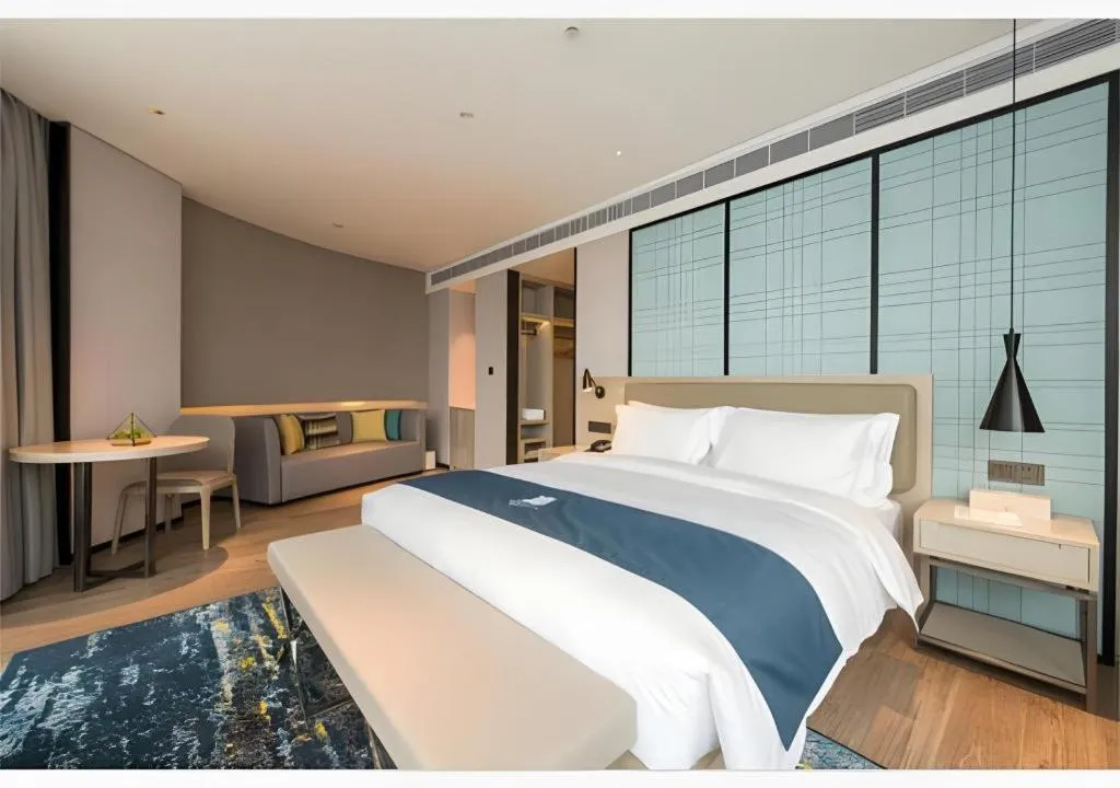Bed in Echarm Hotel Wuxi Zhongnan Road Ancient Canal