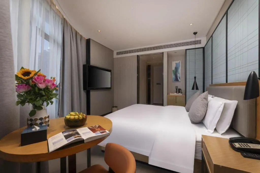 Bed in Echarm Hotel Wuxi Zhongnan Road Ancient Canal