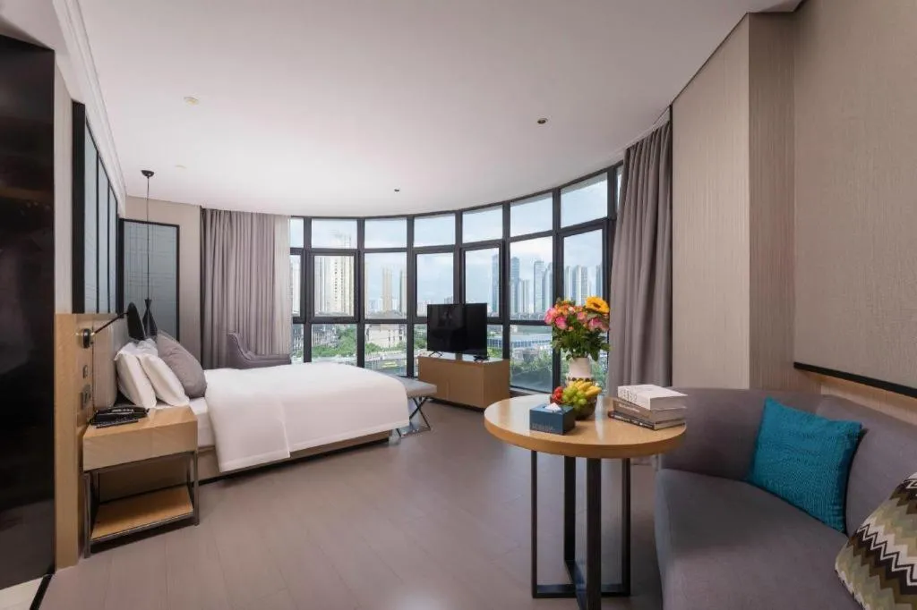 Bed in Echarm Hotel Wuxi Zhongnan Road Ancient Canal