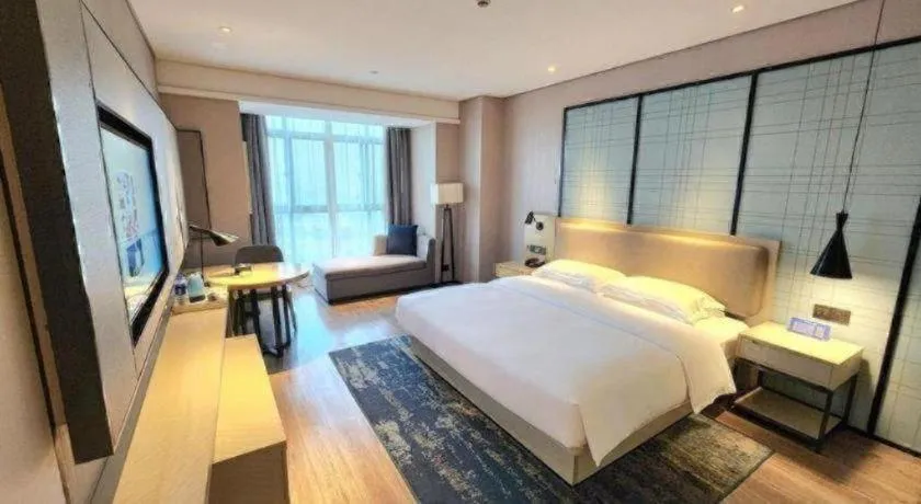 Bed in Echarm Hotel Wuxi Zhongnan Road Ancient Canal