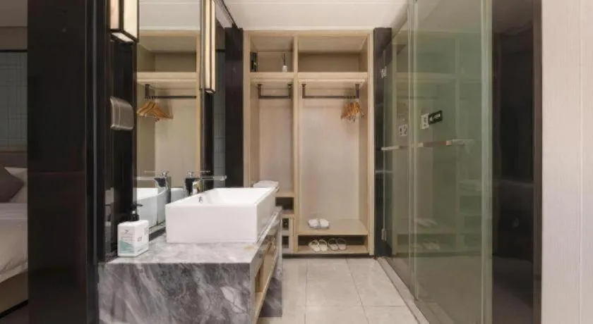 Bed in Echarm Hotel Wuxi Zhongnan Road Ancient Canal