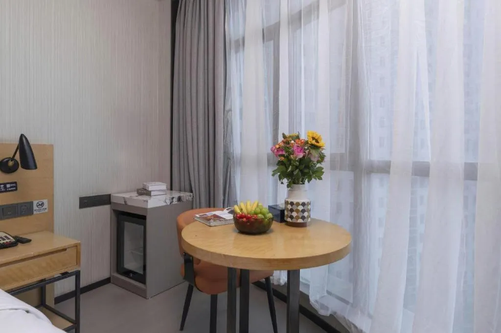 Bed in Echarm Hotel Wuxi Zhongnan Road Ancient Canal