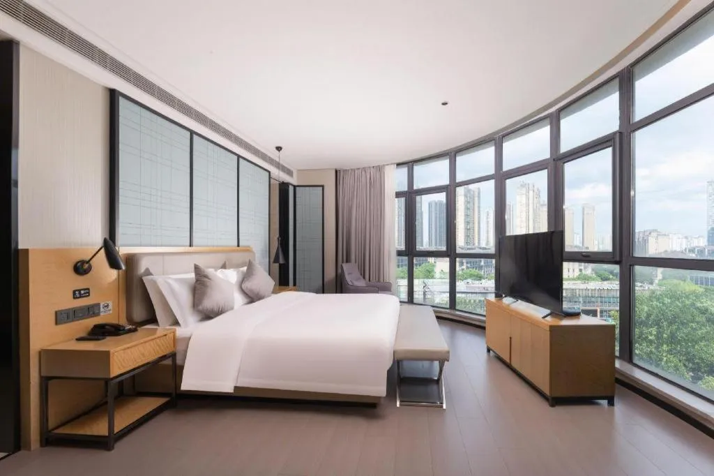 Bed in Echarm Hotel Wuxi Zhongnan Road Ancient Canal