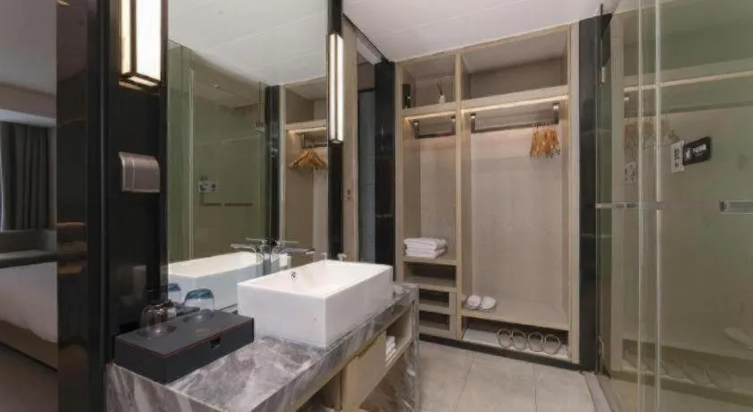 Bed in Echarm Hotel Wuxi Zhongnan Road Ancient Canal