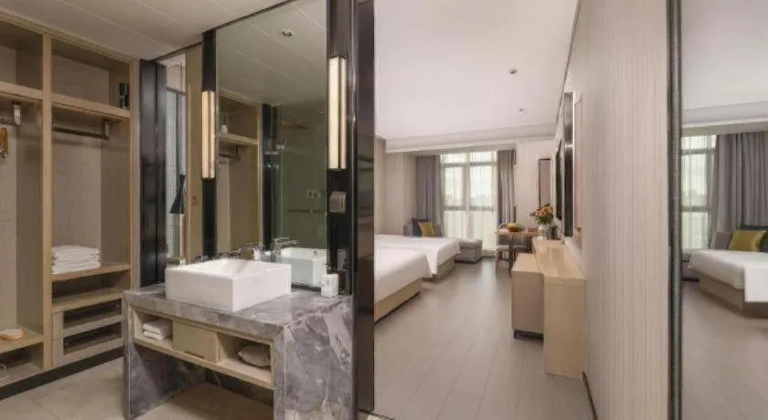 Bed in Echarm Hotel Wuxi Zhongnan Road Ancient Canal