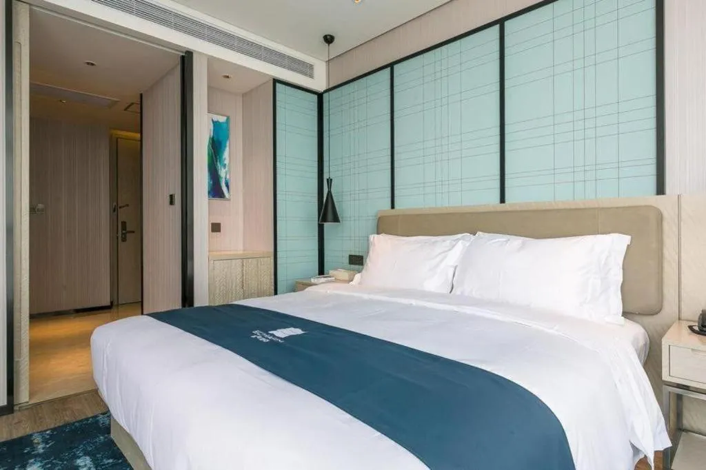Bed in Echarm Hotel Wuxi Zhongnan Road Ancient Canal