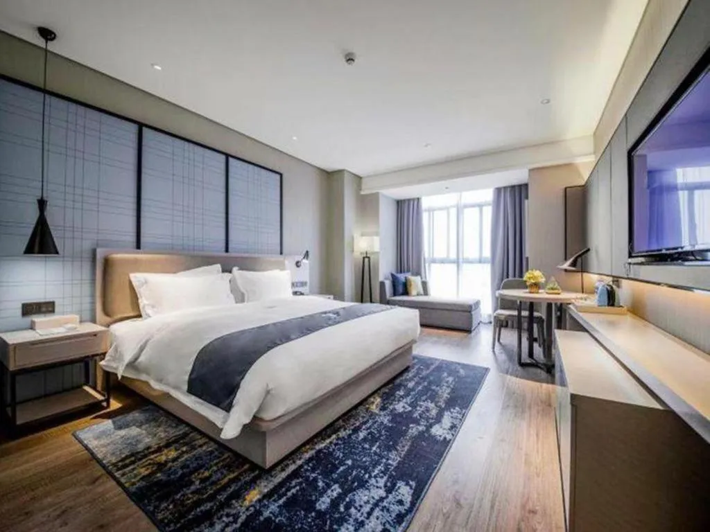 Bed in Echarm Hotel Wuxi Zhongnan Road Ancient Canal