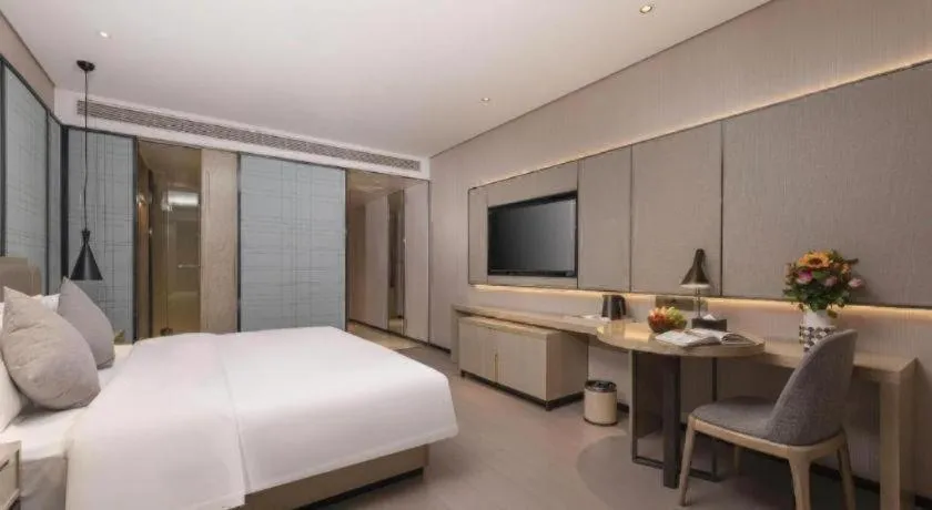 Bed in Echarm Hotel Wuxi Zhongnan Road Ancient Canal