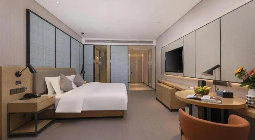 Bed in Echarm Hotel Wuxi Zhongnan Road Ancient Canal