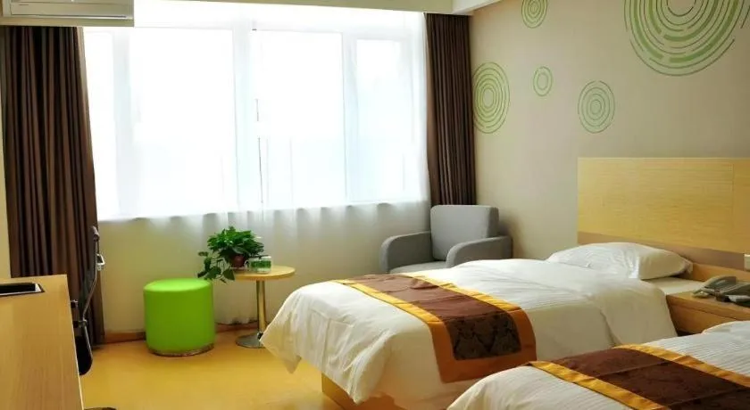 Bed in GreenTree Inn Liaocheng Donge Culture Street Express Hotel