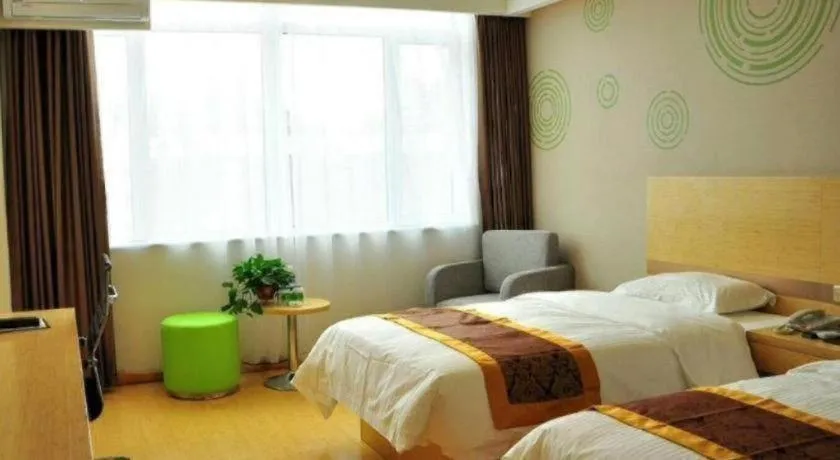 Bed in GreenTree Inn Liaocheng Donge Culture Street Express Hotel