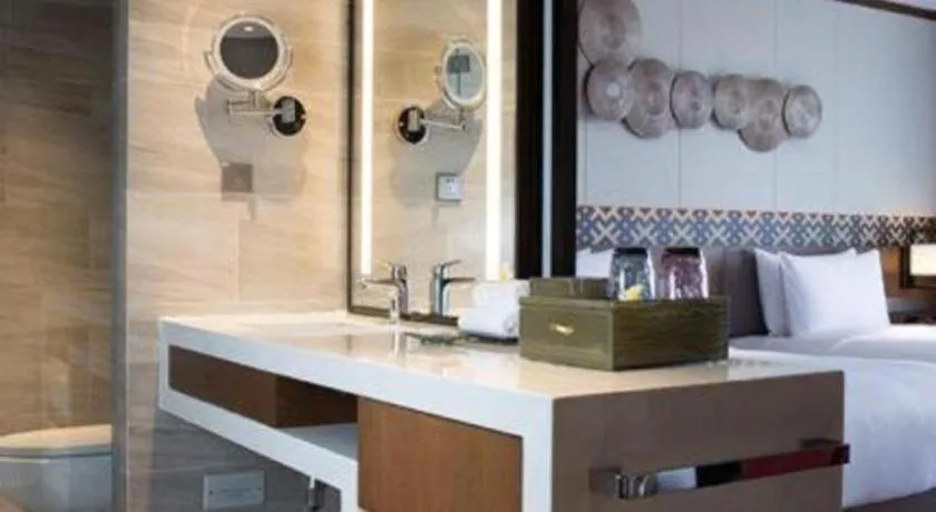 Bed in La Fountain Hotel & Resort Sanya