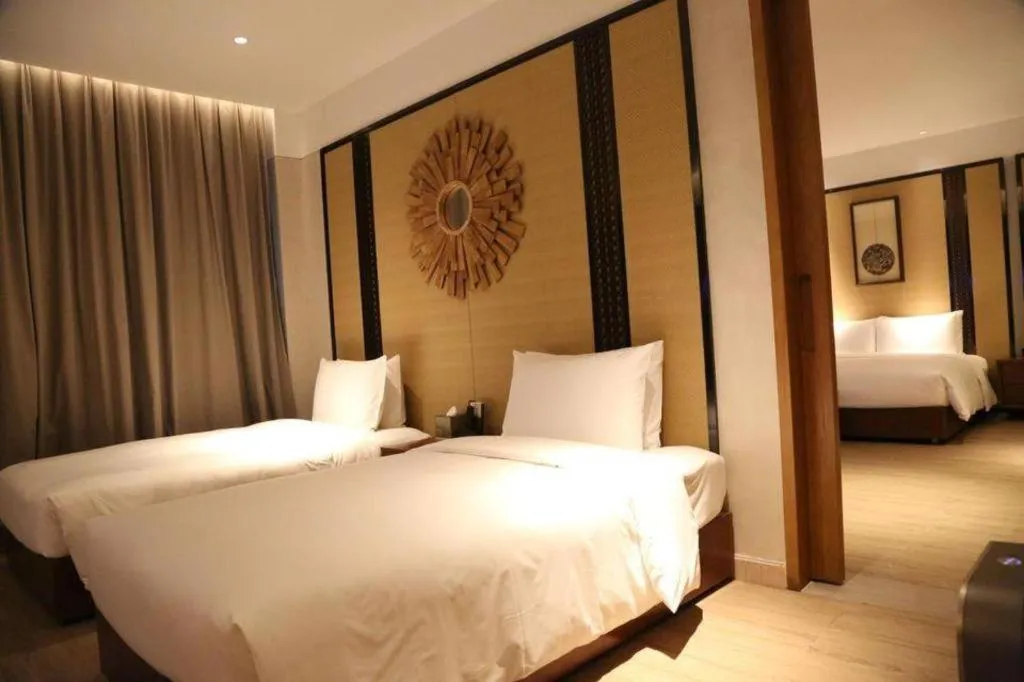 Bed in La Fountain Hotel & Resort Sanya