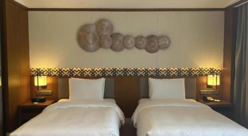 Bed in La Fountain Hotel & Resort Sanya
