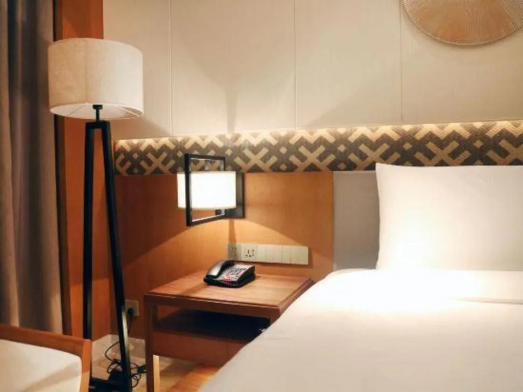 Bed in La Fountain Hotel & Resort Sanya