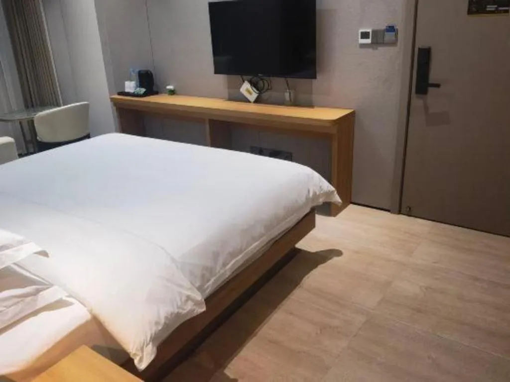 Bed in Magnotel Hotel Huizhou South Station Branch