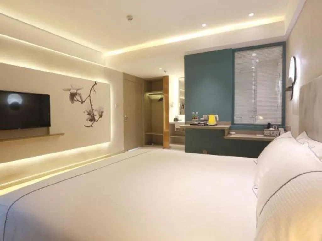 Bed in Magnotel Hotel Huizhou South Station Branch