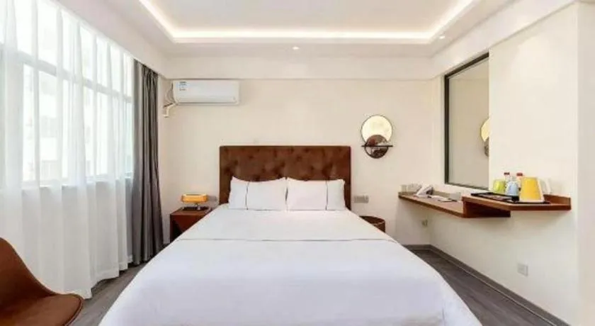 Bed in Magnotel Hotel Huizhou South Station Branch