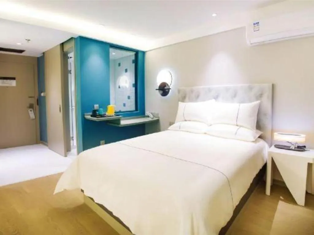 Bed in Magnotel Hotel Huizhou South Station Branch