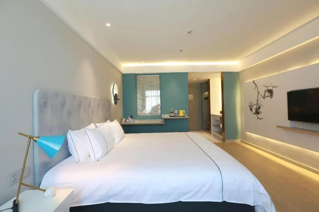 Bed in Magnotel Hotel Huizhou South Station Branch