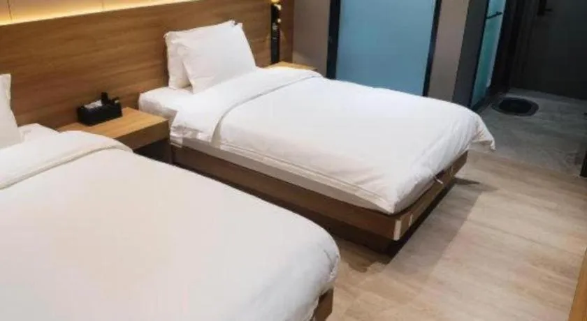 Bed in Magnotel Hotel Huizhou South Station Branch