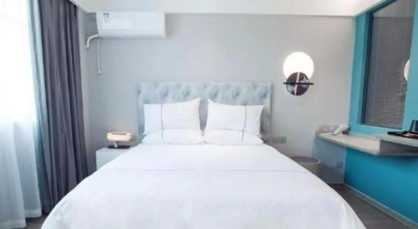 Bed in Magnotel Hotel Huizhou South Station Branch