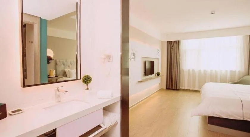 Bed in Magnotel Hotel Huizhou South Station Branch