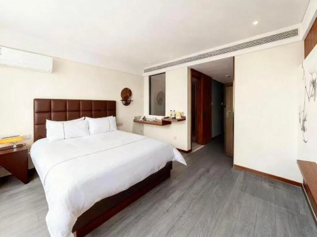 Bed in Magnotel Hotel Huizhou South Station Branch