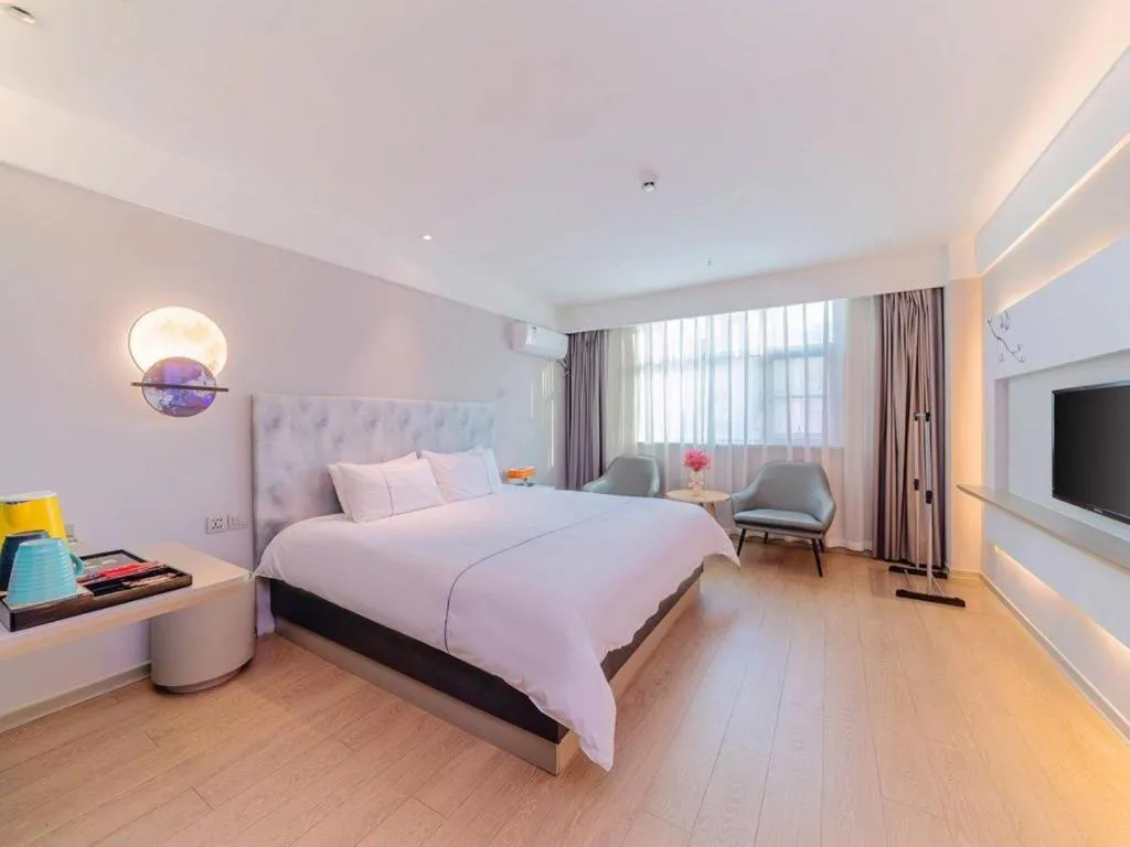 Bed in Magnotel Hotel Huizhou South Station Branch