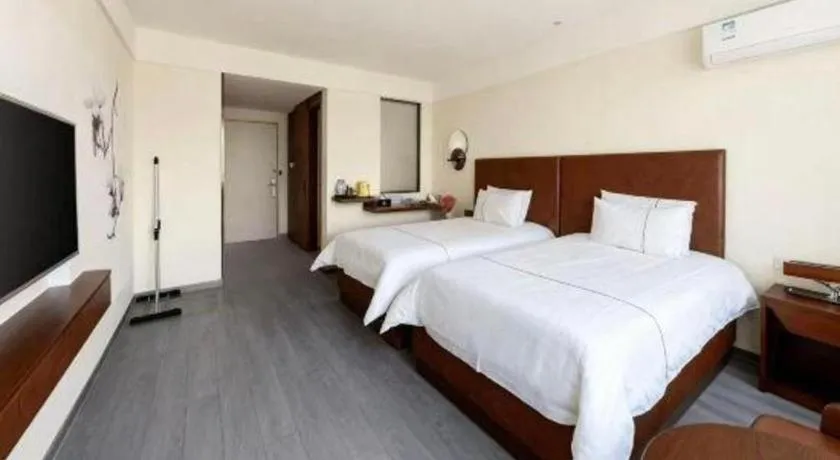 Bed in Magnotel Hotel Huizhou South Station Branch