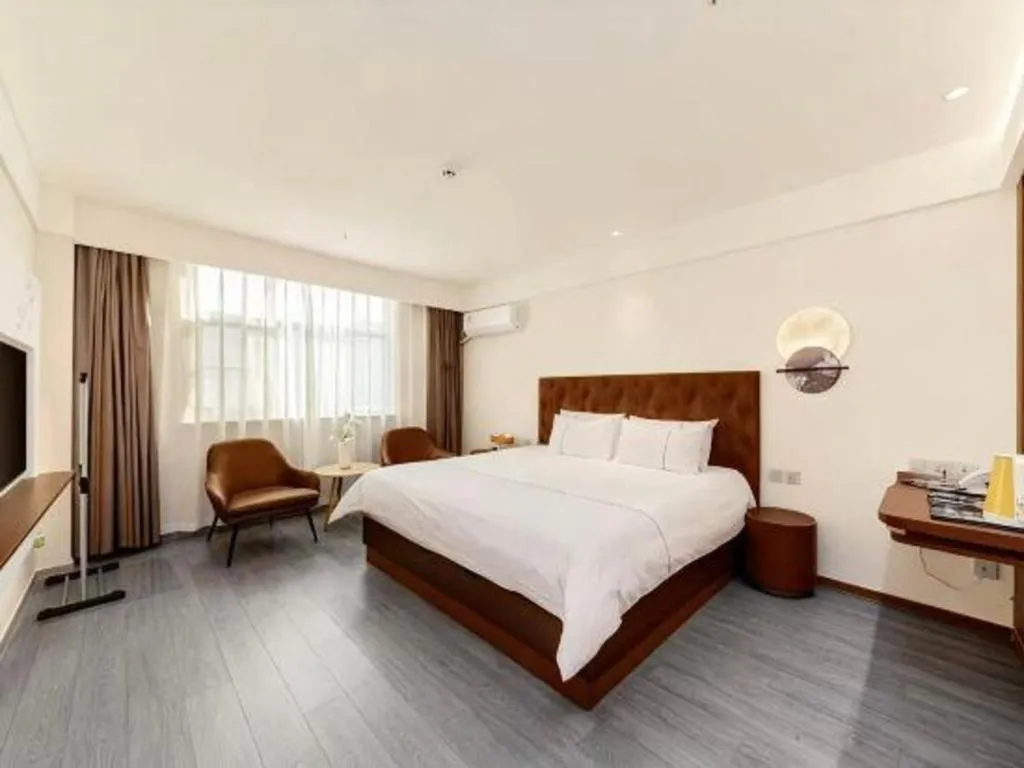 Bed in Magnotel Hotel Huizhou South Station Branch