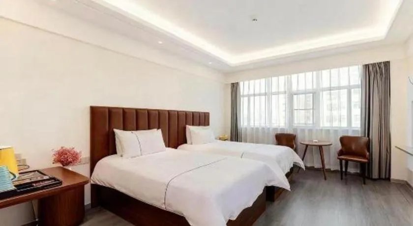 Bed in Magnotel Hotel Huizhou South Station Branch