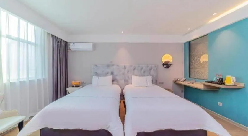 Bed in Magnotel Hotel Huizhou South Station Branch