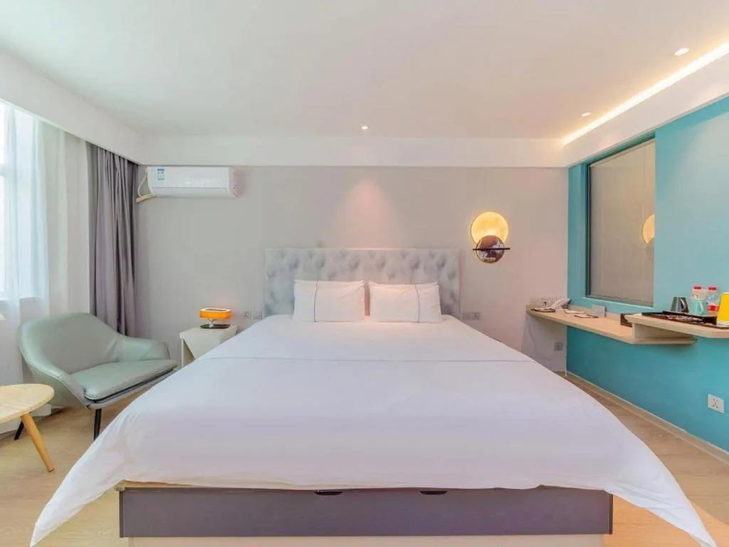 Bed in Magnotel Hotel Huizhou South Station Branch