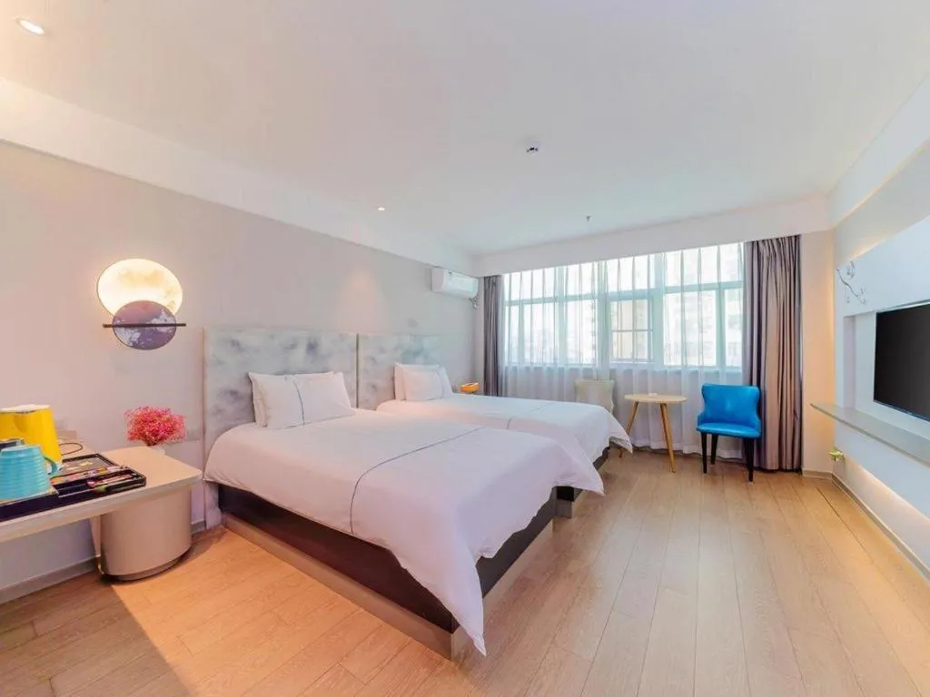 Bed in Magnotel Hotel Huizhou South Station Branch