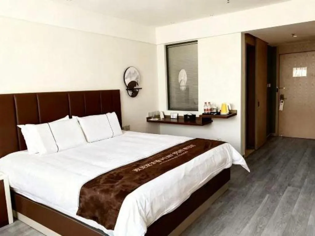 Bed in Magnotel Hotel Huizhou South Station Branch