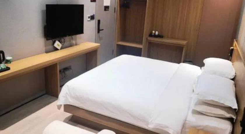 Bed in Magnotel Hotel Huizhou South Station Branch