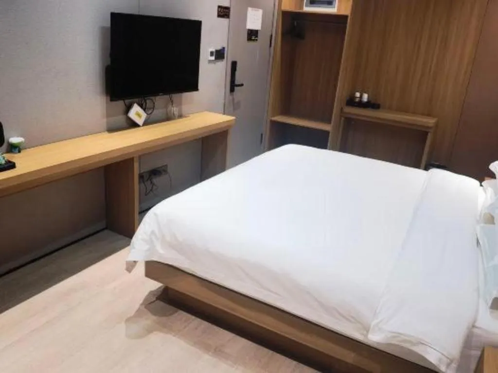 Bed in Magnotel Hotel Huizhou South Station Branch